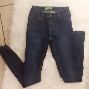 Dark wash mid raise skinny jeans